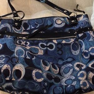 Coach bag in perfect condition .  Both bag and hand purse are perfect.